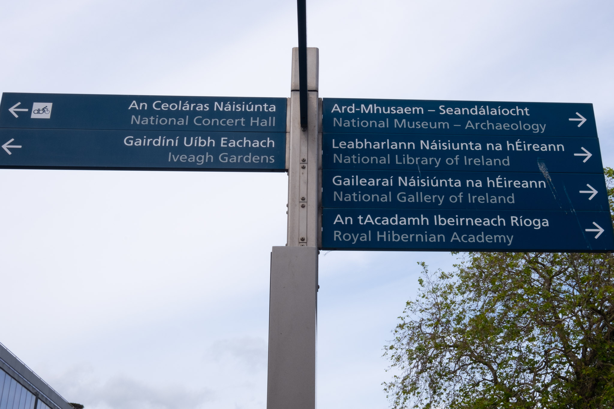 Street Sign with arrows to the National Concert Hall, Iveagh Gardens, National Museum of Archeology, National Library of Ireland, National Gallery of Ireland, and the Royal Hibernian Academy